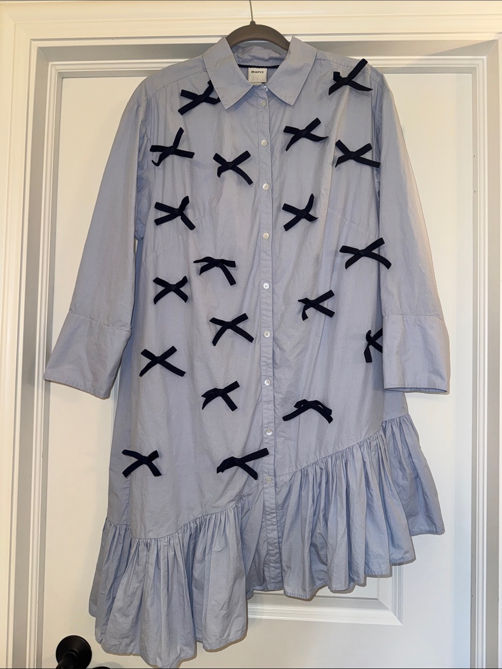Maeve Light Blue Asymmetrical Shirt Dress with Navy Bow Accents
